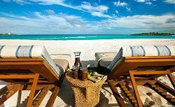 Bahamas - Lounge chairs facing the ocean, generic beach scene